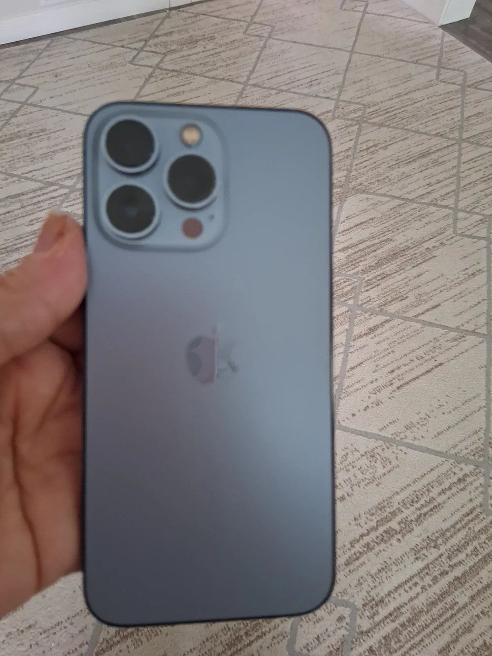 Apple Black Smartphone with Blue-Green Display